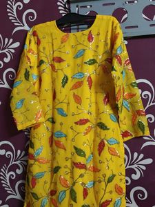 Vibrant Kurta Set with Floral Embellishments
