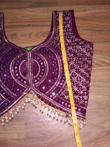 Stunning Purple Embroidered Lehenga Choli