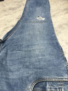 Blue Denim Jeans with Distressed Detail