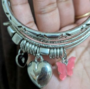 Pretty bangle set with cute charms.