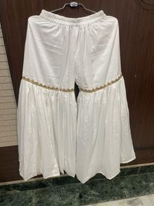 Elegant White Palazzo Pants with Gold Trim
