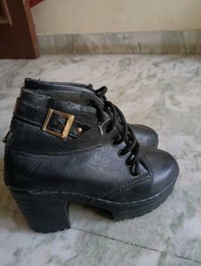 Black Heeled Boots with Buckle Detail