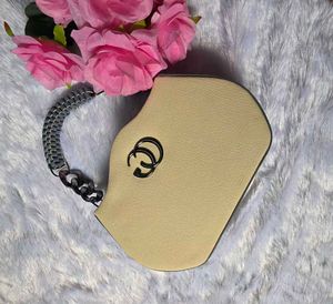 BRAND NEW Chic Beige Mini Handbag with Statement C