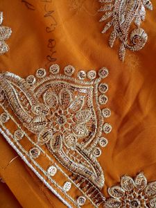 Elegant Orange Embroidered Saree