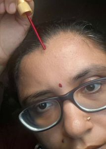 it is maroon and deep red shringar bindi stick