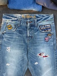 Distressed Patch Jeans