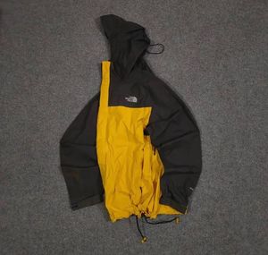 THE NORTH FACE YELLOW AND BLACK JACKET
