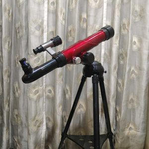 Red Telescope with Tripod