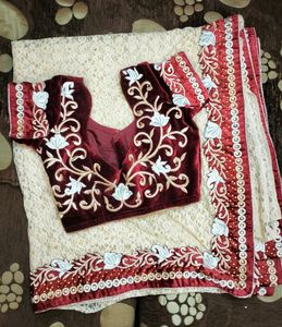 Designer Saree With Red Velvet Blouse And Border