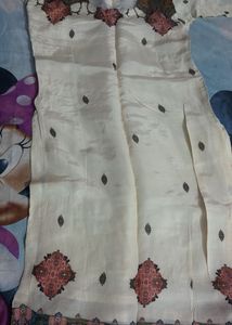 Elegant Cream Kurta Set with Tassels