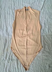 Sleek Peach Bodysuit