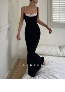 Sleek Black Spaghetti Strap Dress with Lace Trim