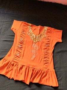 Orange Embellished top