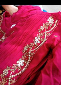 Elegant Pink Draped Gown
