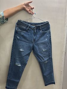 Distressed Blue Denim Jeans