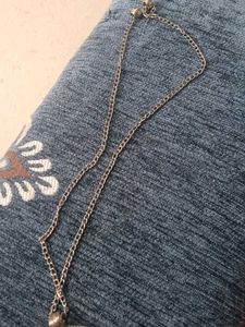oxidised silver long necklace with peacock feather