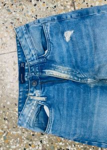 Blue Distressed Flare Jeans