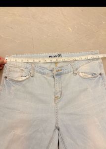 Distressed Light Wash Denim Jeans