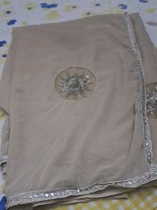 Elegant Beige Saree with Embellishment
