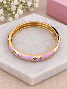 Elegant Gold and Lavender Bangle
