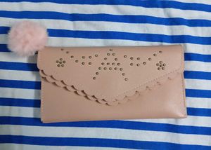 Chic Pink Studded Clutch with Pom Po