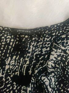 WOMEN'S PRINTED RUFFLE TOP
