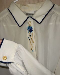 Elegant Cream Blouse with Blue Embroidery