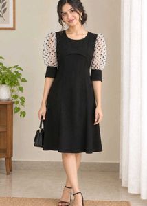 Chic Black Dress with Polka Dot Sleeves