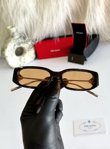 Prada Tortoiseshell Sunglasses