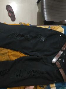 Black torn jeans