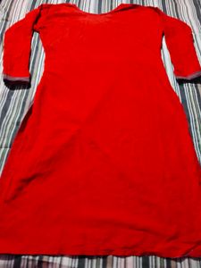 Vibrant Red Kurta with Intricate Neckline