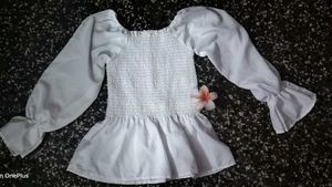 White Smocked Peplum Top