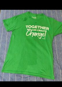 Green Tshirt with Tan shorts