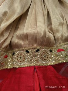 designer red and cream gown