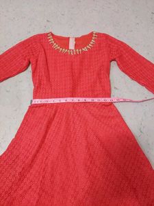 Elegant Coral Lace Gown with Embellished Neckline