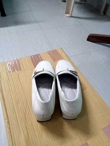 Stylish White Loafers with Buckle Accent
