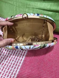 Floral Print Oval Clutch Bag