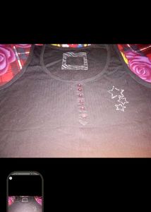 Black Tank Top with Star Embellishments