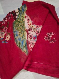 Vibrant Red Saree with Peacock Print