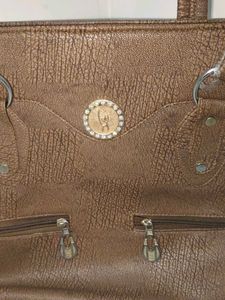 Stylish Brown Textured handbag Bag