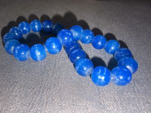 Set of 4 Beaded Bracelets with Charm