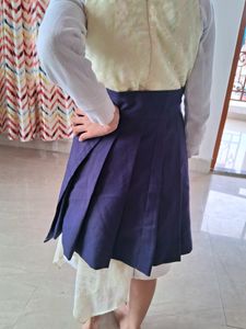 Plated Wrapped Mini Skirt.
