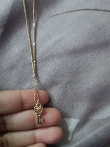 2 Golden Chains with pendant