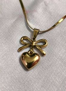 Gold Heart & Bow Pendant Necklace