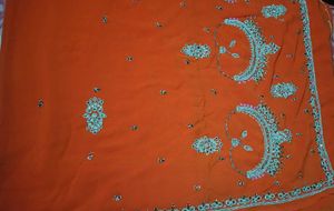 Elegant Orange Embroidered Saree