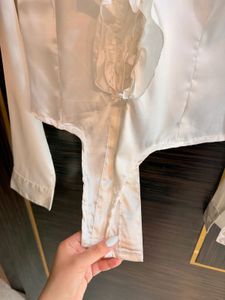 Elegant White Ruffled Satin Shirt