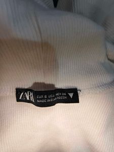 Sleeveless Turtleneck Top