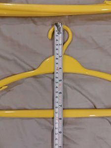 Set of 6 Yellow Plastic Hangers
