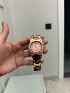 Elegant Rose Gold Watch with Pink Dial