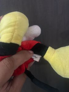 Mickey Mouse plush toy, resembling the classic